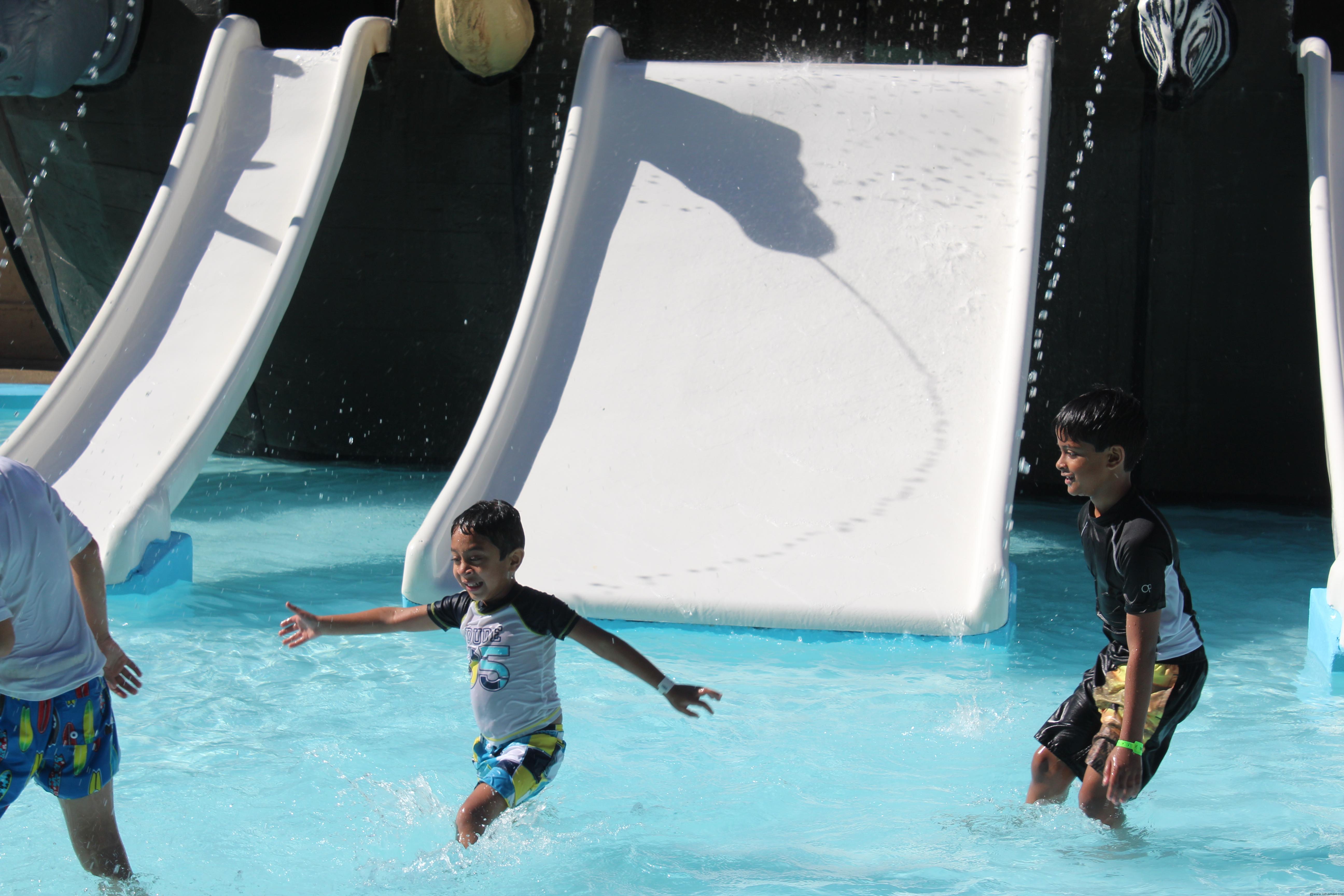 Boys having fun inside the water park